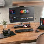 Thinkcentre M90a Pro on a desk with laptop and accessories