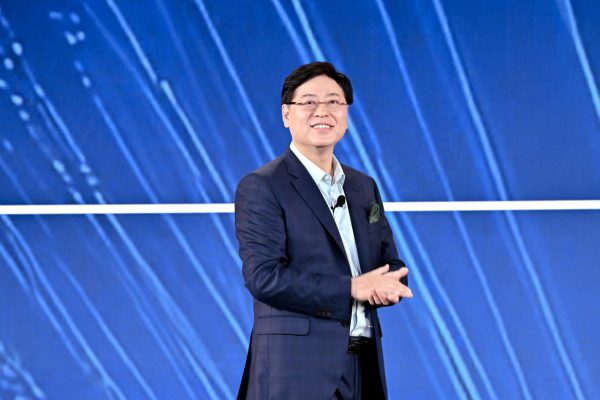 Yuanqing Yang on stage at Tech World Shanghai