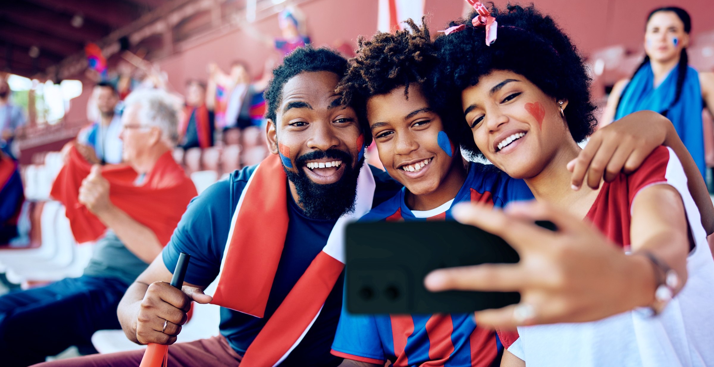 FIFA World Cup - fans taking a selfie in the stadium.