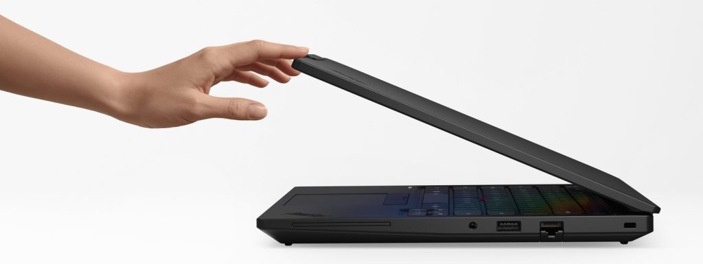 ThinkPad T14 in profile with a hand opening it