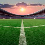 Sunset over a soccer stadium